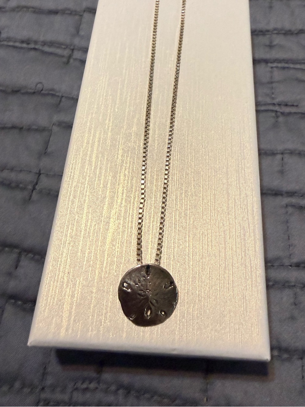 Sterling silver sand dollar pendant and 16 inch chain Mignon Faget